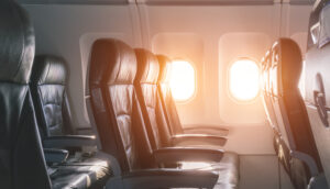 row of seats on an airplane in economy class