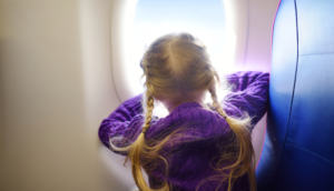 Alt tag not provided for image https://www.airfarewatchdog.com/blog/wp-content/uploads/sites/26/2018/05/Girl-Airplane-Child-Kid-Children-Window-300x172.png