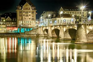 Alt tag not provided for image https://www.airfarewatchdog.com/blog/wp-content/uploads/sites/26/2018/10/basel_at_night-300x201.jpg