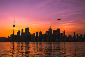 airplane sunset toronto billy bishop skyline travel