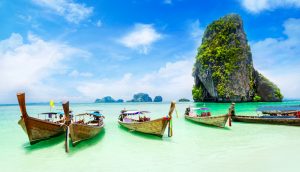 Alt tag not provided for image https://www.airfarewatchdog.com/blog/wp-content/uploads/sites/26/2019/07/Phuket-Thailand-Boats-Beach-Phi-Phi-Clear-300x172.jpg