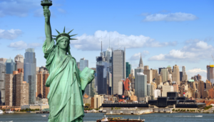 Statue of Liberty overlooking New York Skyline