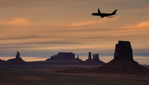 Airplane Flying in the desert, southwest silhouette