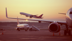 Airplanes taking off on tarmac aircraft generic