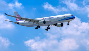 China Airlines A330 in flight with clouds