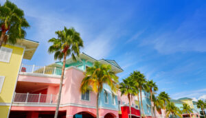 colorful beach houses in fort myers florida with palm trees