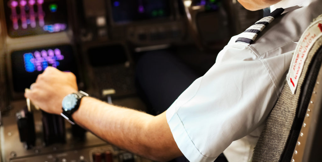 Pilot in airplane cockpit