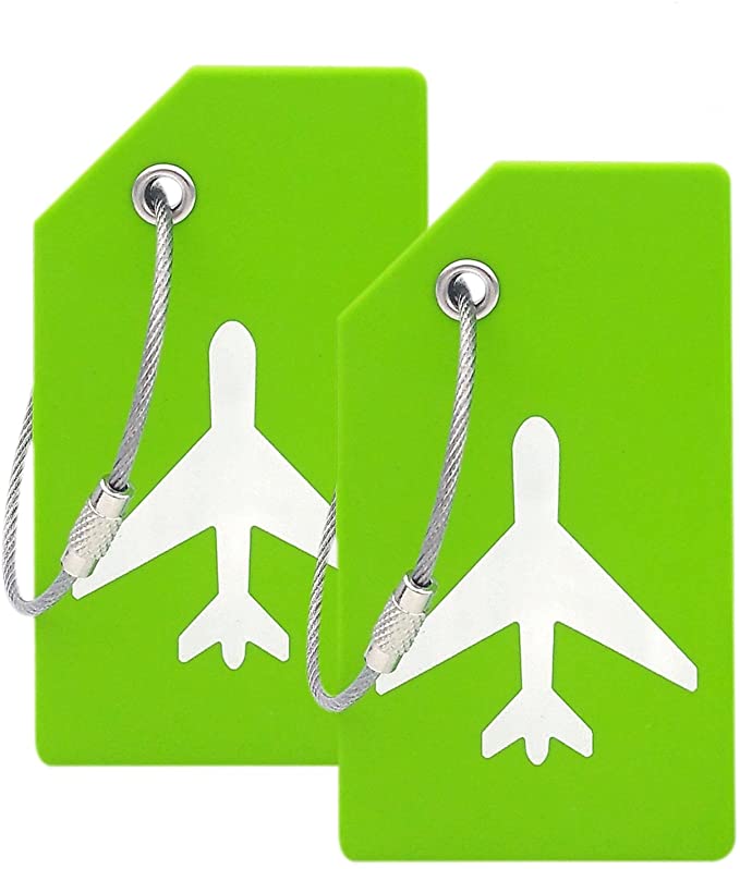 Two green luggage tags with airplanes on them