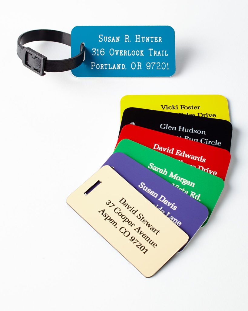 Several luggage tags in different colors