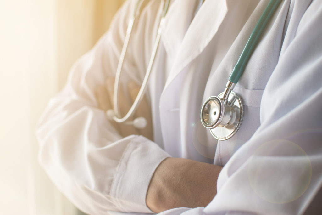 Close up of doctor with stethoscope